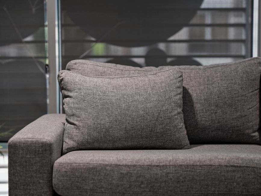 Upholstery cleaning on a modern sofa